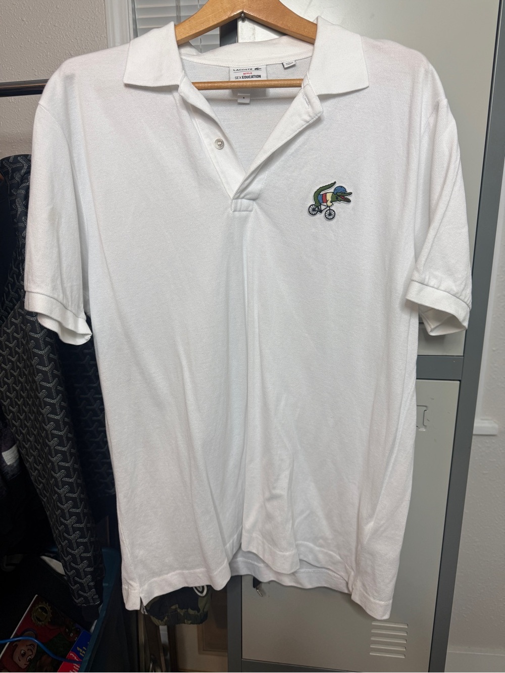 Lacoste sex ed polo shirt